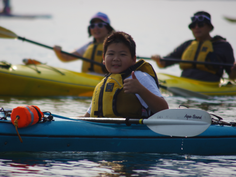 Youth paddler in kayak at the Paddle for Health event
