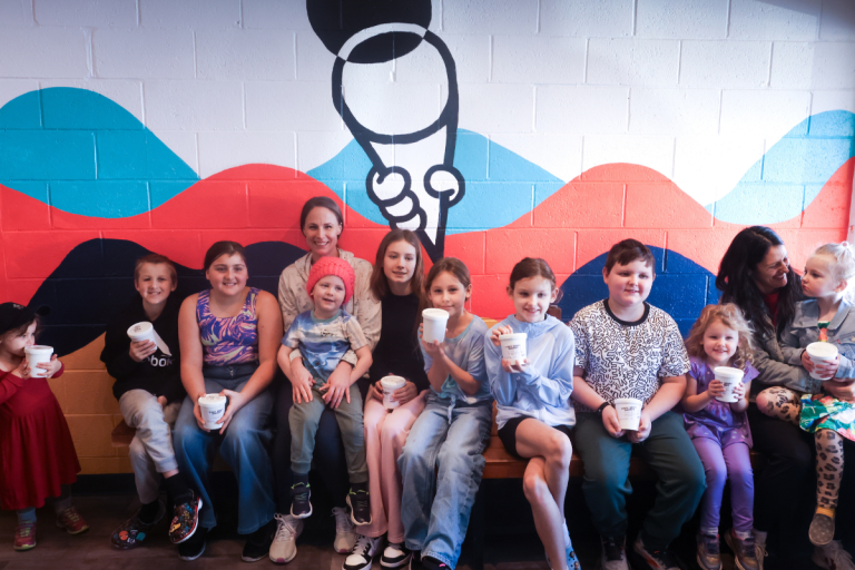 IKCA Families sat together enjoying 49 Below Ice Cream